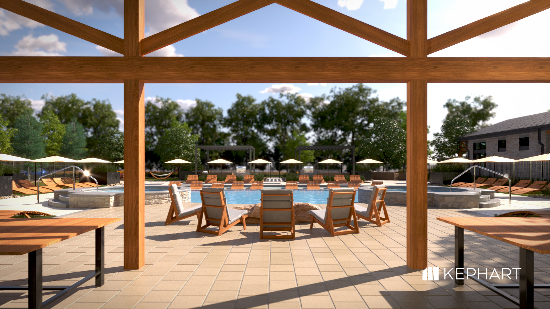 Poolside area viewed through a wooden pergola, with lounge chairs around a blue pool, beige tiles, and large umbrellas; trees and a building in the background.