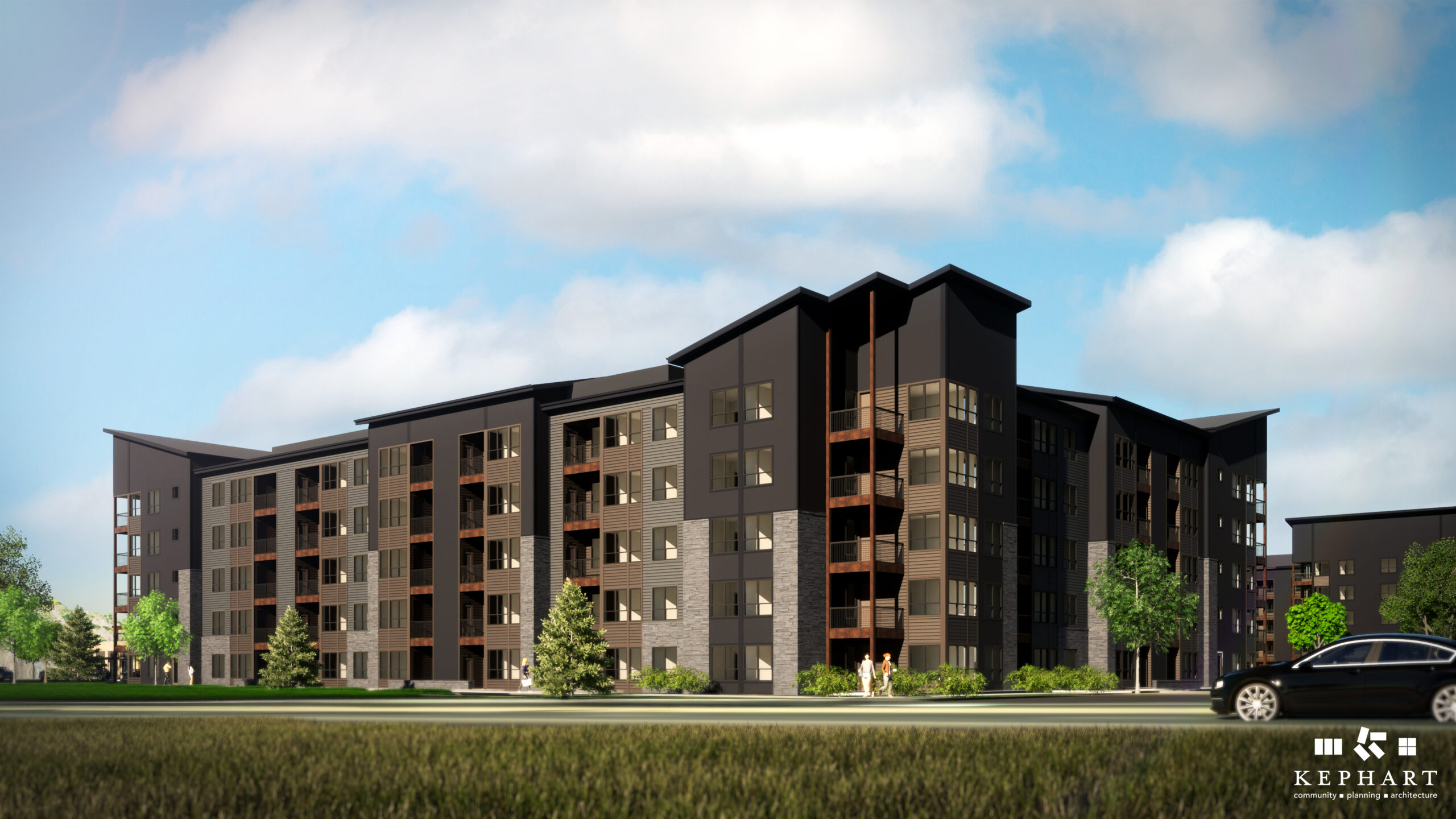Modern multi-story apartment building with dark gray facade, balconies, and landscaped grounds under a blue sky.